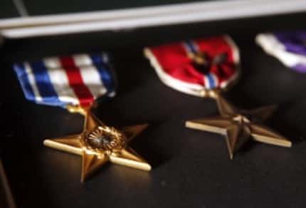  A Silver Star (left) and a Bronze Star with Valor. (2015 File Photo/Tom Fox)