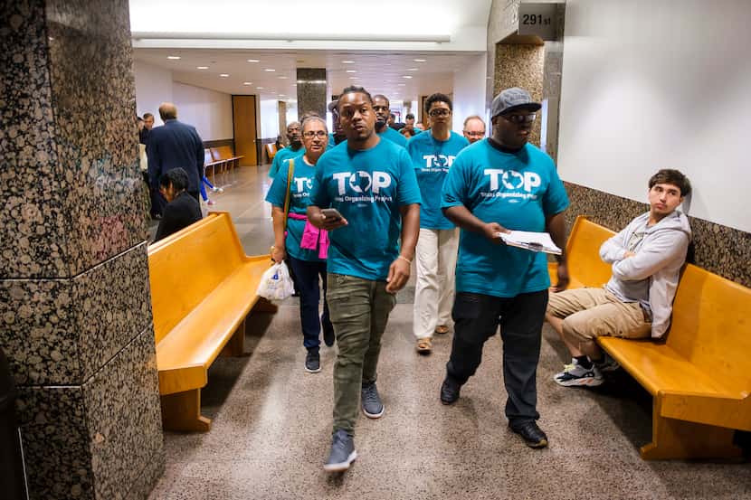 A group of Texas Organizing Project (TOP) representatives visit Dallas County felony court...