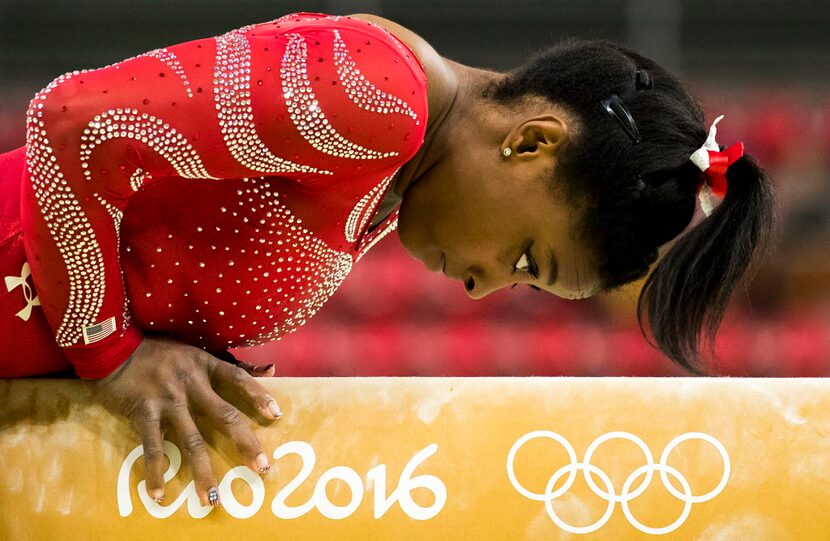 USA gymnast Simone Biles of Houston practice on the balance beam during a training session...