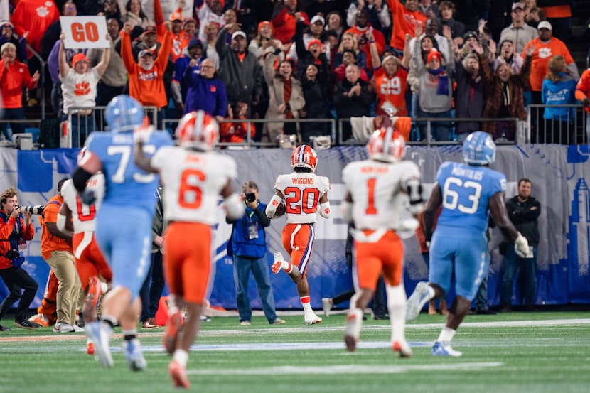 Clemson cornerback Nate Wiggins (20) returns an interception for a touchdown in the second...