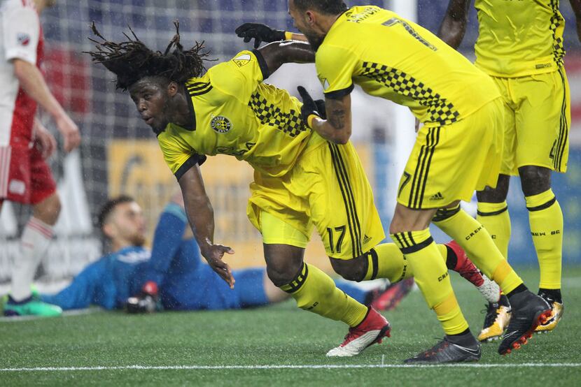 Columbus Crew midfielder Artur (7) celebrates a goal by defender Lalas Abubakar (17) during...