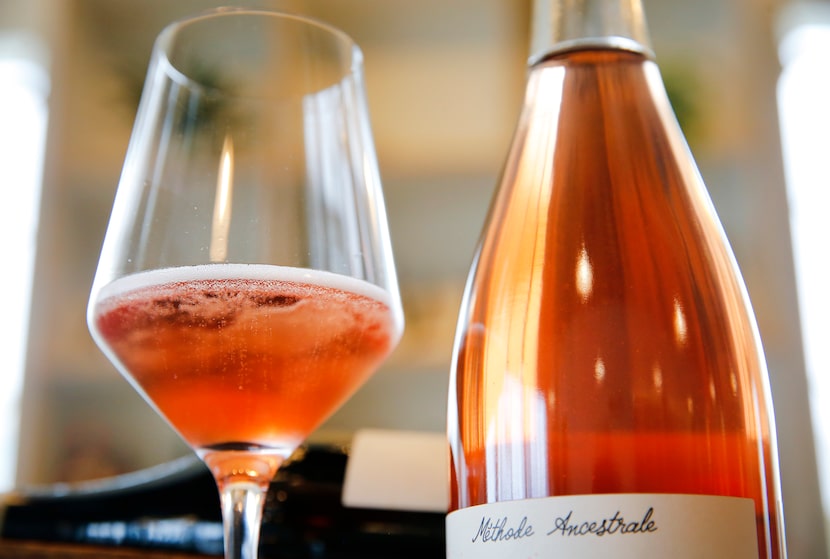 A glass of Les Capriades piege a filles rose is pictured at Bar and Garden on Ross Avenue in...