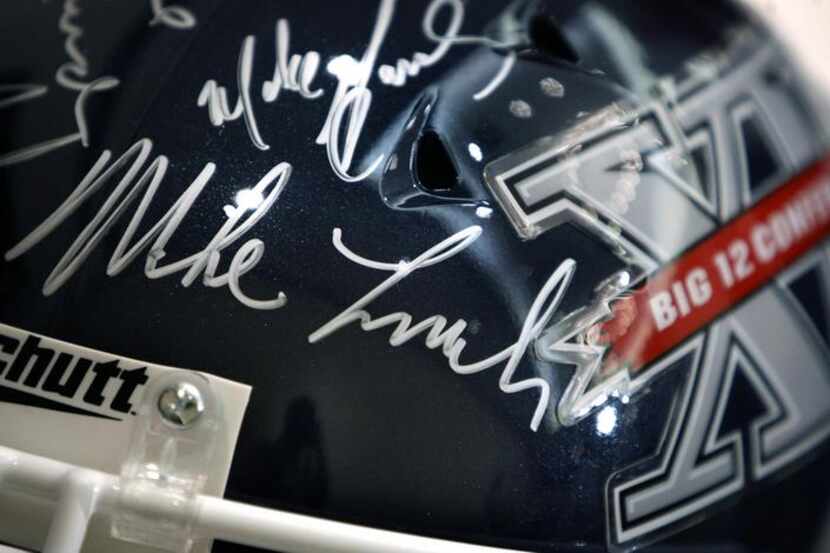 July 29, 2009: A football helmet on display during Big 12 Media Days bears the signature of...
