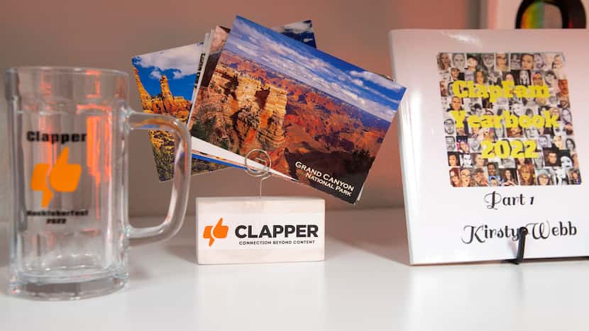 A Clapper mug and yearbook sit on a shelf at the Clapper offices on Friday, April 7, 2023 in...