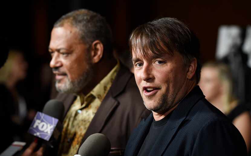 Richard Linklater, right, director/co-writer of "Last Flag Flying," and cast member Laurence...