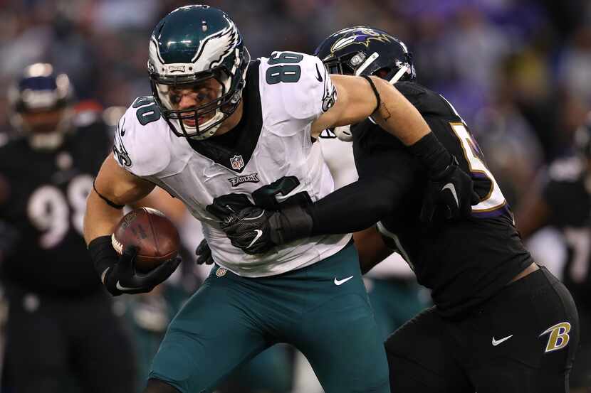 BALTIMORE, MD - DECEMBER 18: Tight end Zach Ertz #86 of the Philadelphia Eagles carries the...