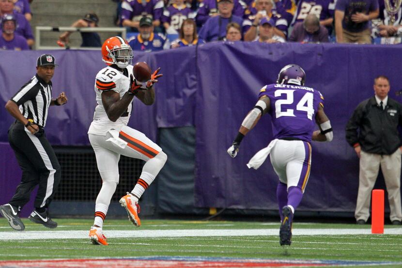 Cleveland Browns wide receiver Josh Gordon (12) catches a touchdown pass during the first...
