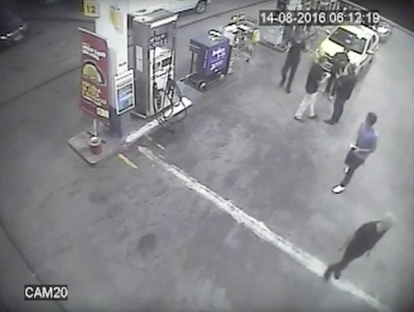 Surveillance video shows part of the incident at a Brazilian gas station involving American...