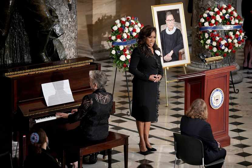 Denyce Graves sings during a ceremony to honor the late Justice Ruth Bader Ginsburg as she...