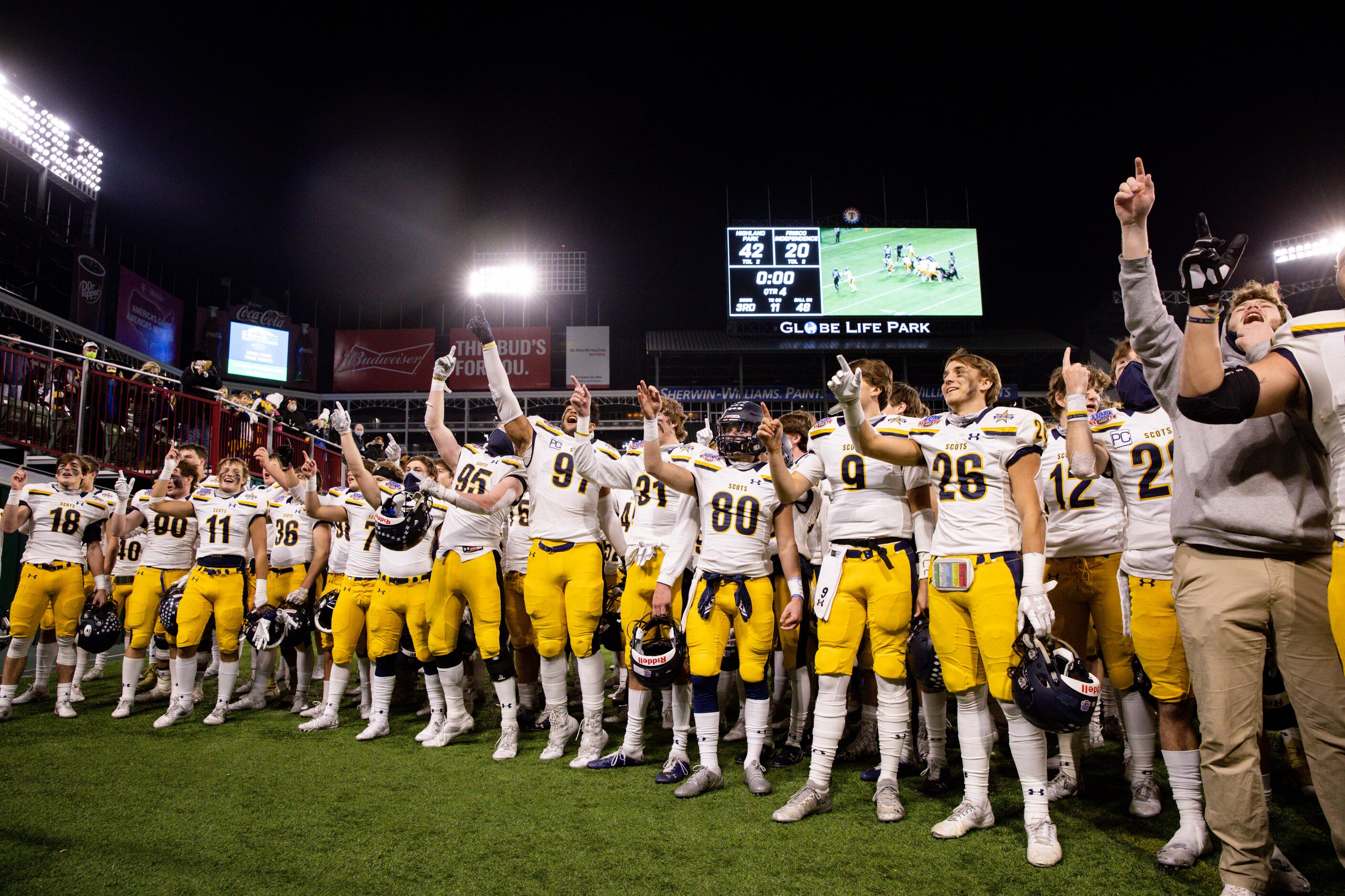 Highland Park players sing their school song after winning a Class 5A Division I area-round...