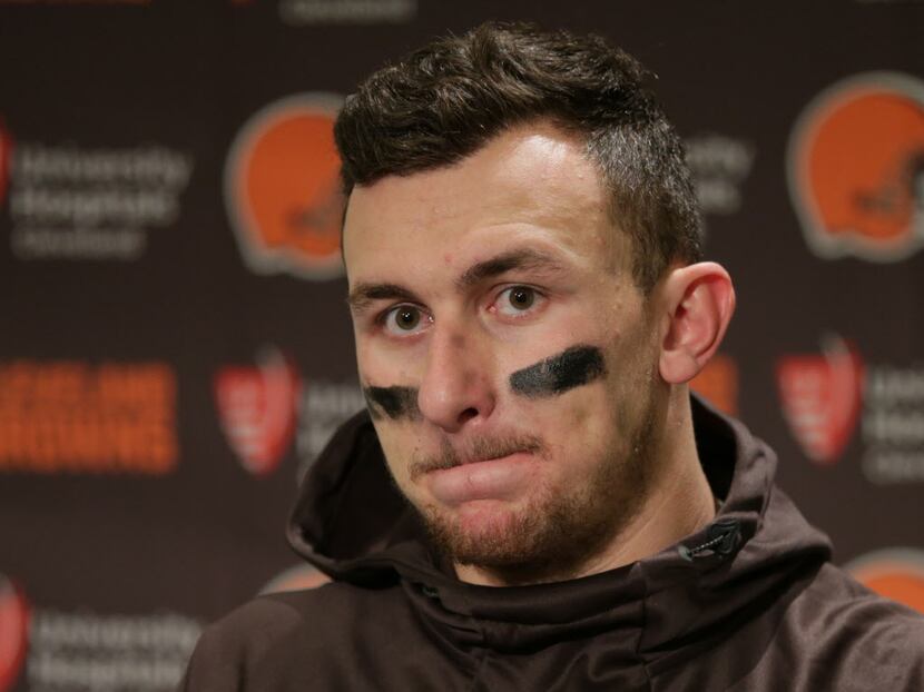 Cleveland Browns quarterback Johnny Manziel speaks with media members following the team's...