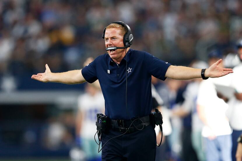 Dallas Cowboys head coach Jason Garrett reacts after a penalty was called for unnecessary...