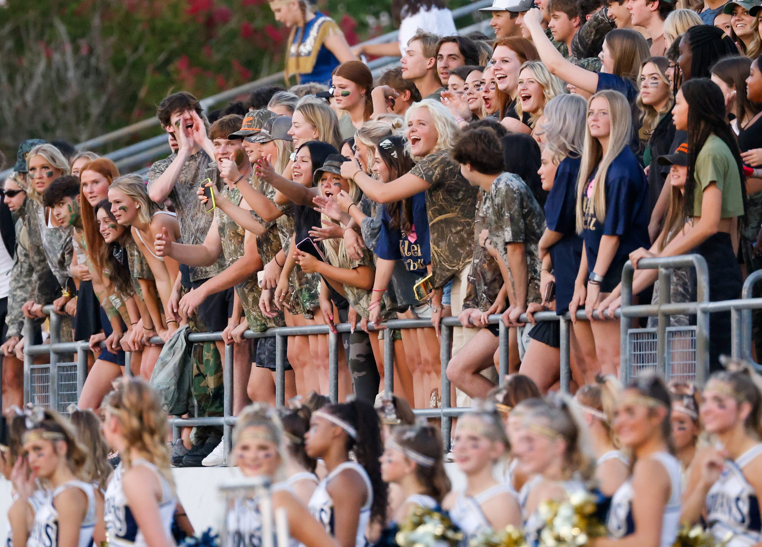 Keller High School fans cheer for their team during the first half of a game against V.R....