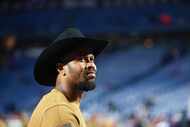 Buffalo Bills' Von Miller walks on the field before an NFL football game against the Denver...