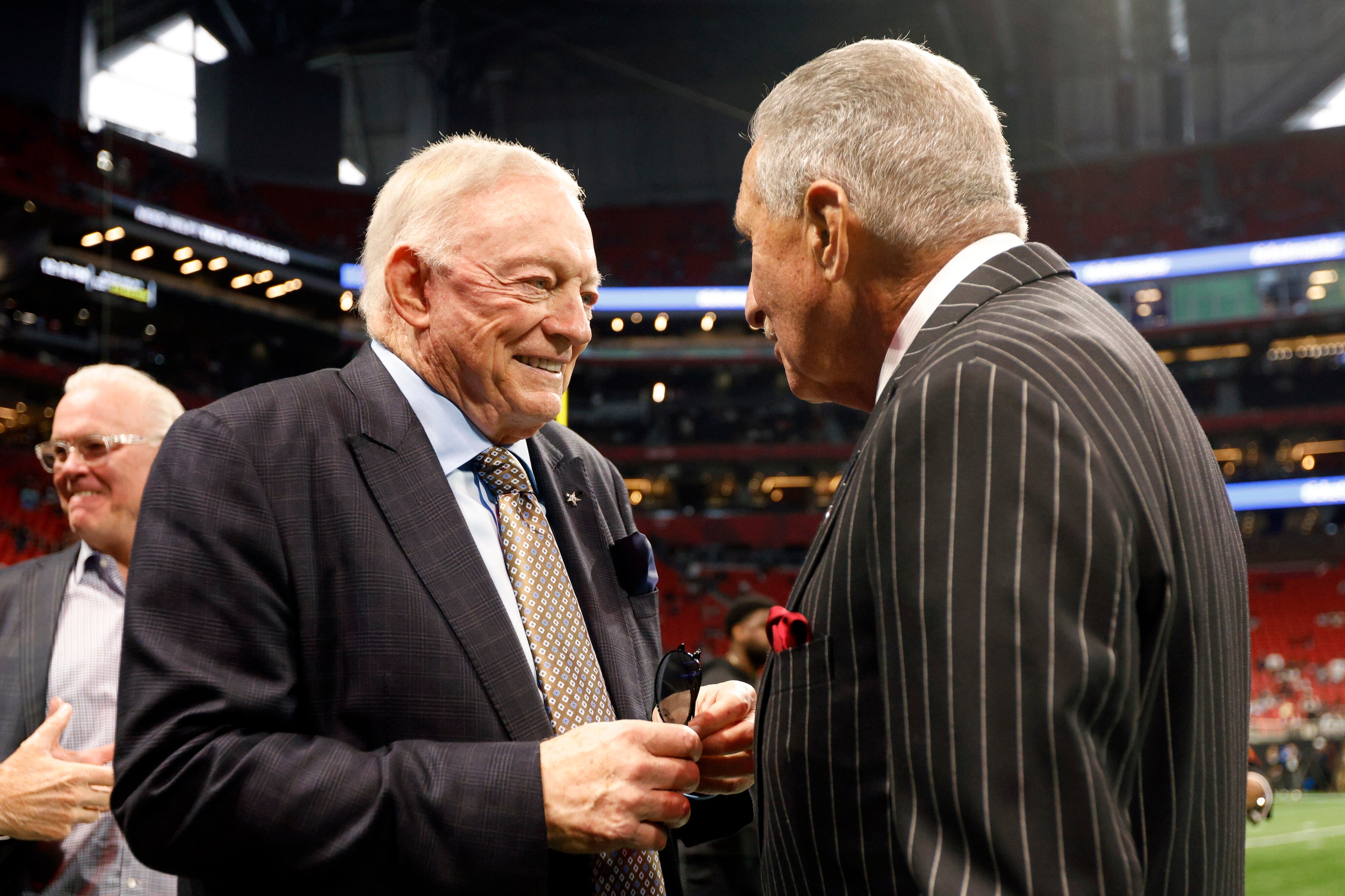 Dallas Cowboys owner Jerry Jones talks with Atlanta Falcons owner Arthur Blank before a...