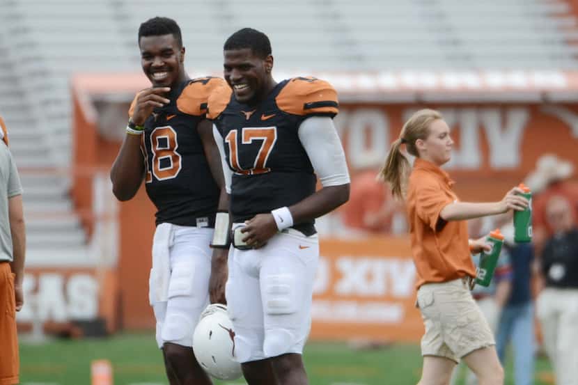 Texas Longhorns quarterbacks Tyrone Swoopes (18) and Miles Onyegbule (17) react during the...
