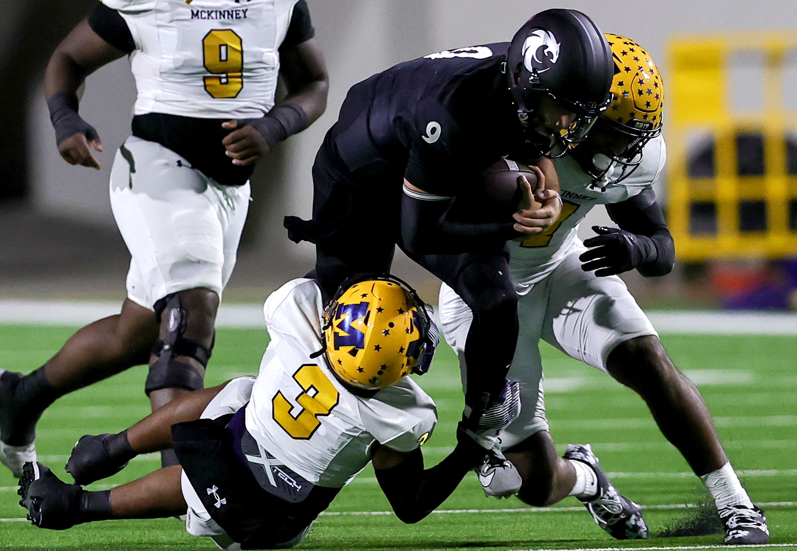 Denton Guyer quarterback Kevin Sperry (9) is finally brought down by McKinney linebacker...