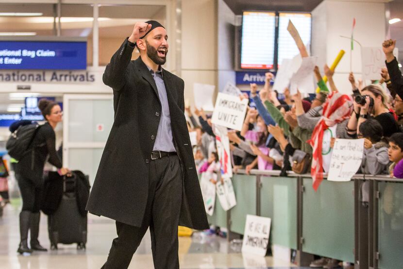 Imam Omar Suleiman celebrated Sunday with protesters at DFW International Airport who...