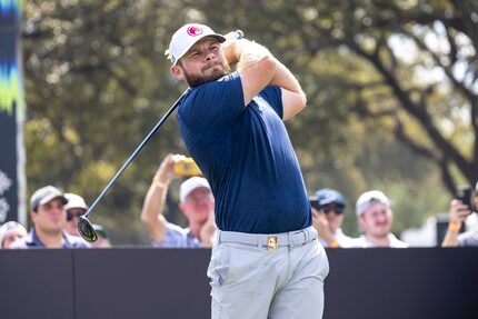 Tyrrell Hatton, of Legion XIII, hits from the 10th tee during the semifinals of LIV Golf...