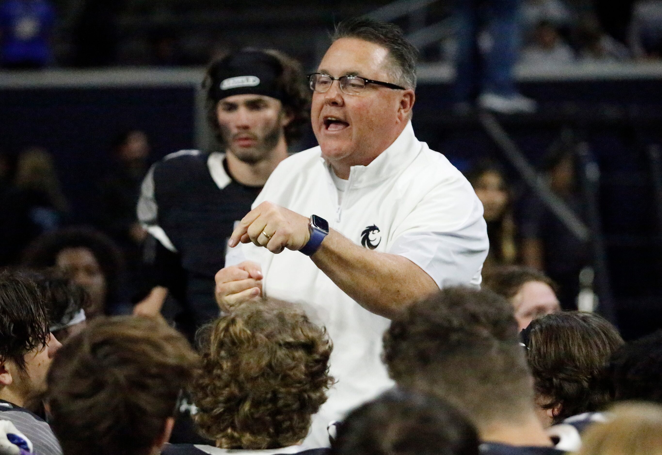 Guyer High School head coach Rodney Webb talks to his team after defeating Trophy Club Byron...