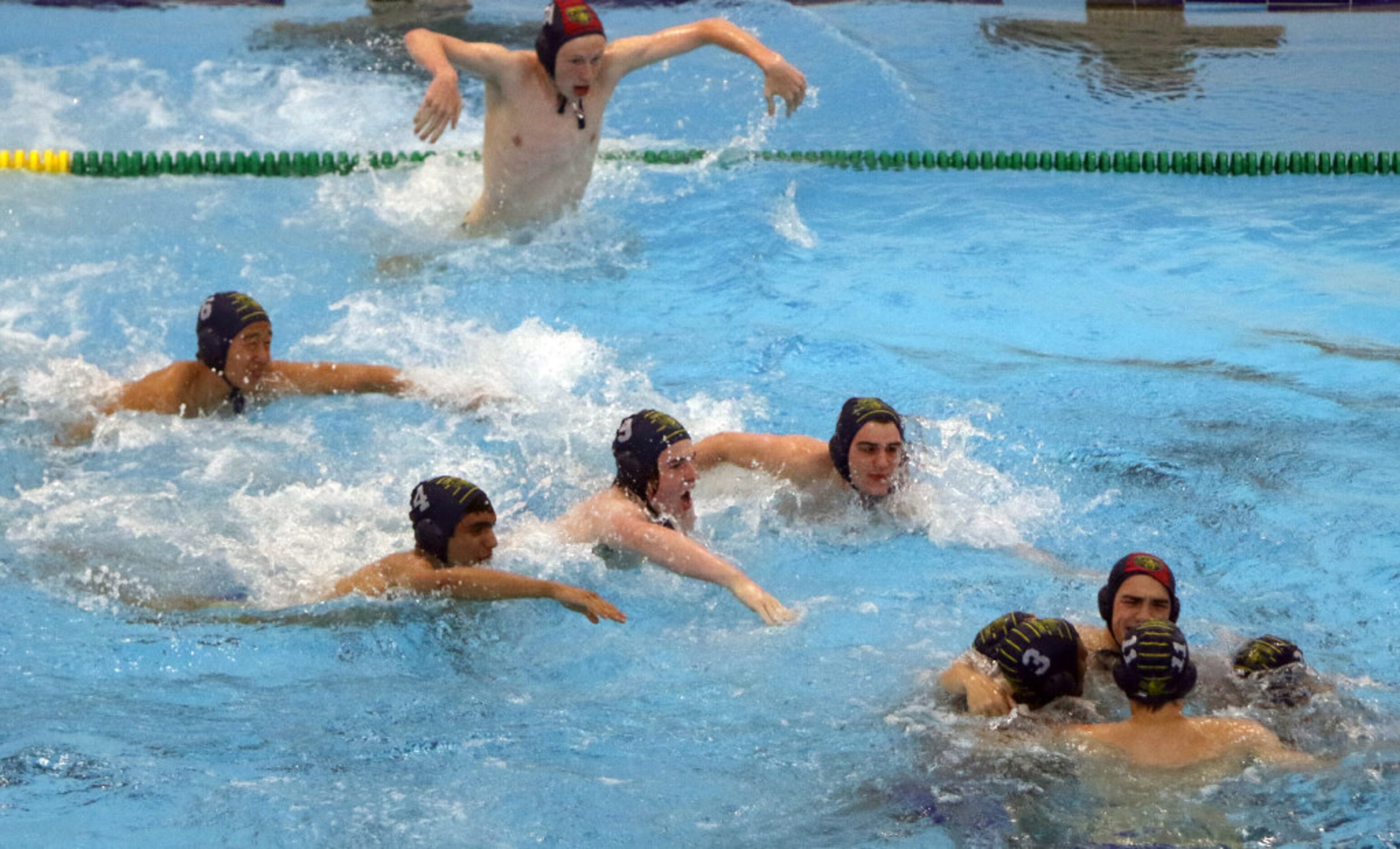 The bench cleared as water polo team members from St Mark's joined the others in the middle...