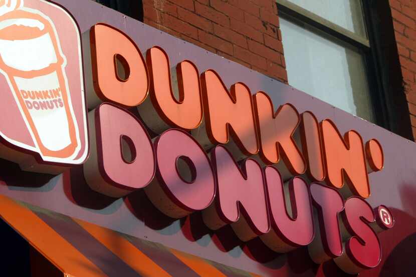 ORG XMIT: *S0414955656* NEW YORK - MAY 13:  (FILE PHOTO) A Dunkin Donuts sign is seen May...