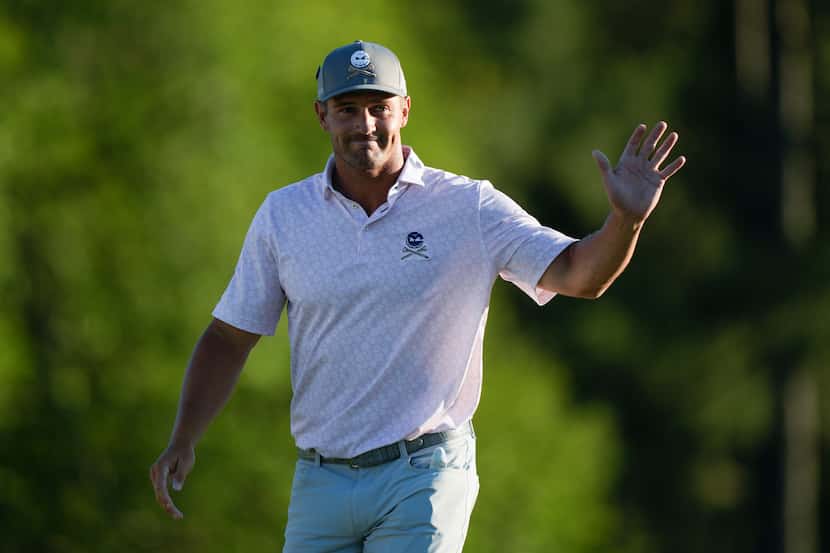Bryson DeChambeau celebrates after a birdie on the 18th hole during third round at the...