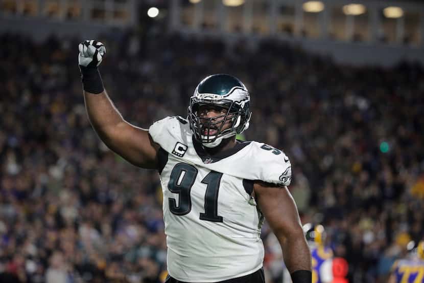 Philadelphia Eagles' Fletcher Cox reacts to a play during an NFL football game against the...