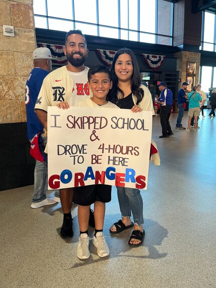 Ian Guerrero, 9, poses for a photo with his parents Eric and Natalie Guerrero before the...