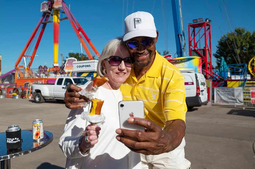 Carole Rhodes and Preston Pearson take a selfie together with their Fletcher's Corny Dogs at...