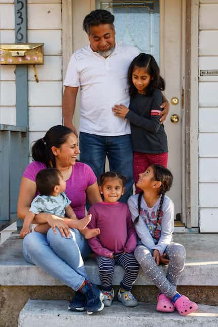 Denisse Gutierrez poses for a portrait with her family from left, Gabriel Alvarez, 1,...
