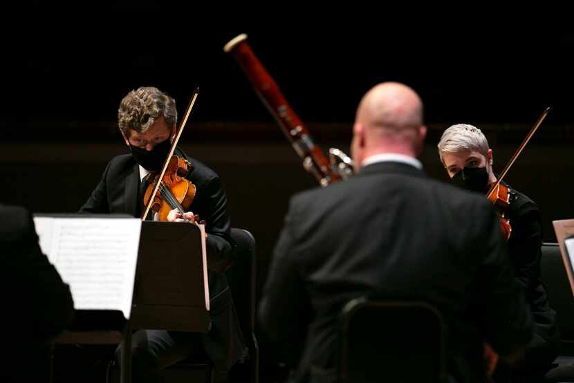 Violinist James Ehnes (left) performs Beethoven's Septet in E flat major with members of the...
