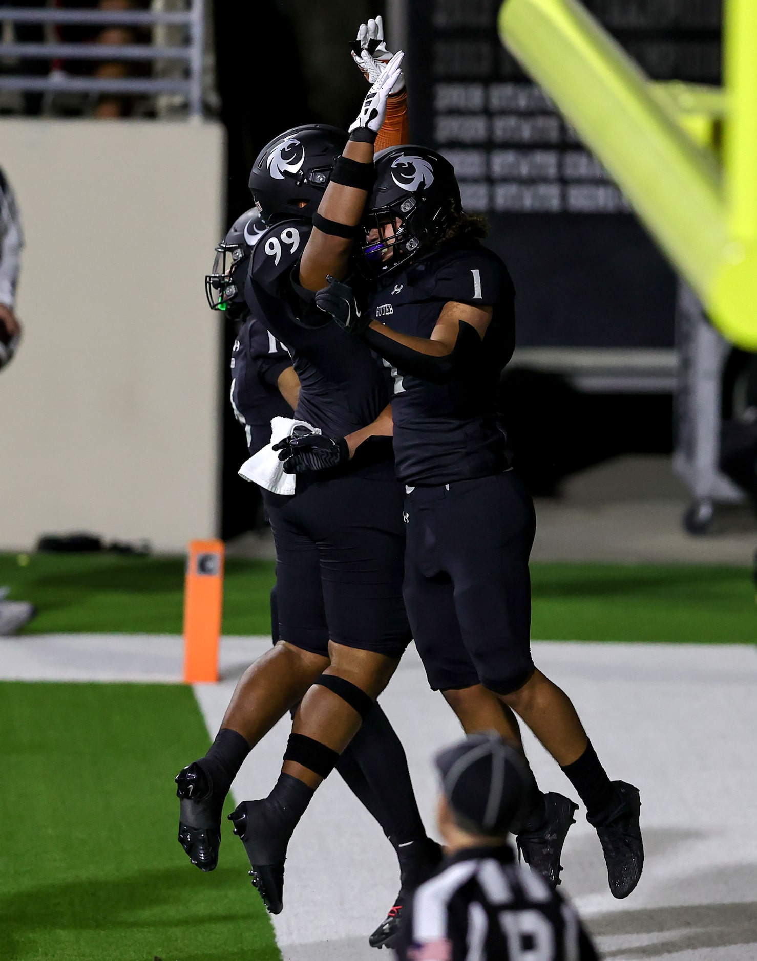 Denton Guyer running back Kaedyn Cobbs (1) celebrates with offensive lineman Khyren Haywood...