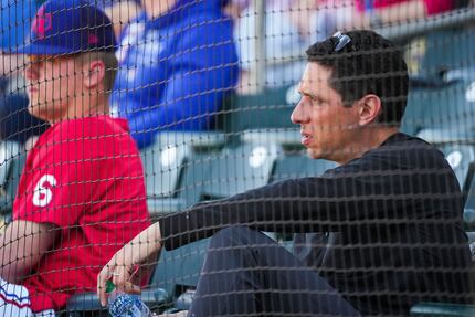 Texas Rangers president, baseball operations, Jon Daniels watches from the stands with...