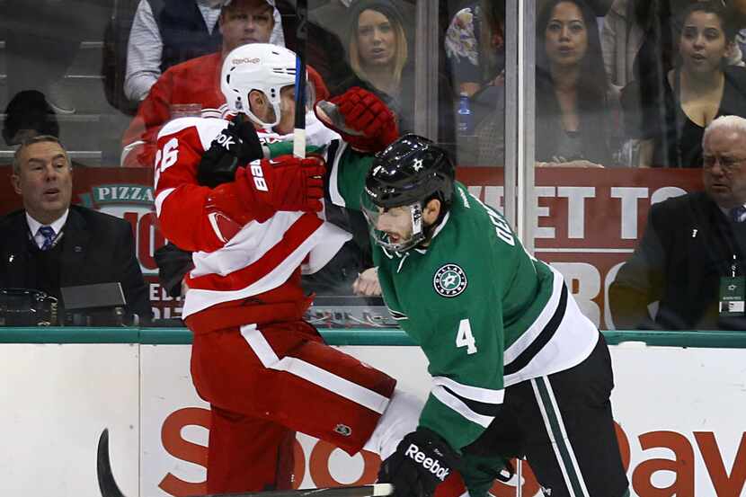Detroit Red Wings right wing Tomas Jurco (26) and Dallas Stars defenseman Jason Demers (4)...