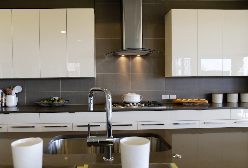 Kitchen area in the MainVue Homes Carmel Q1 model home at Phillips Creek Ranch in Frisco, on...