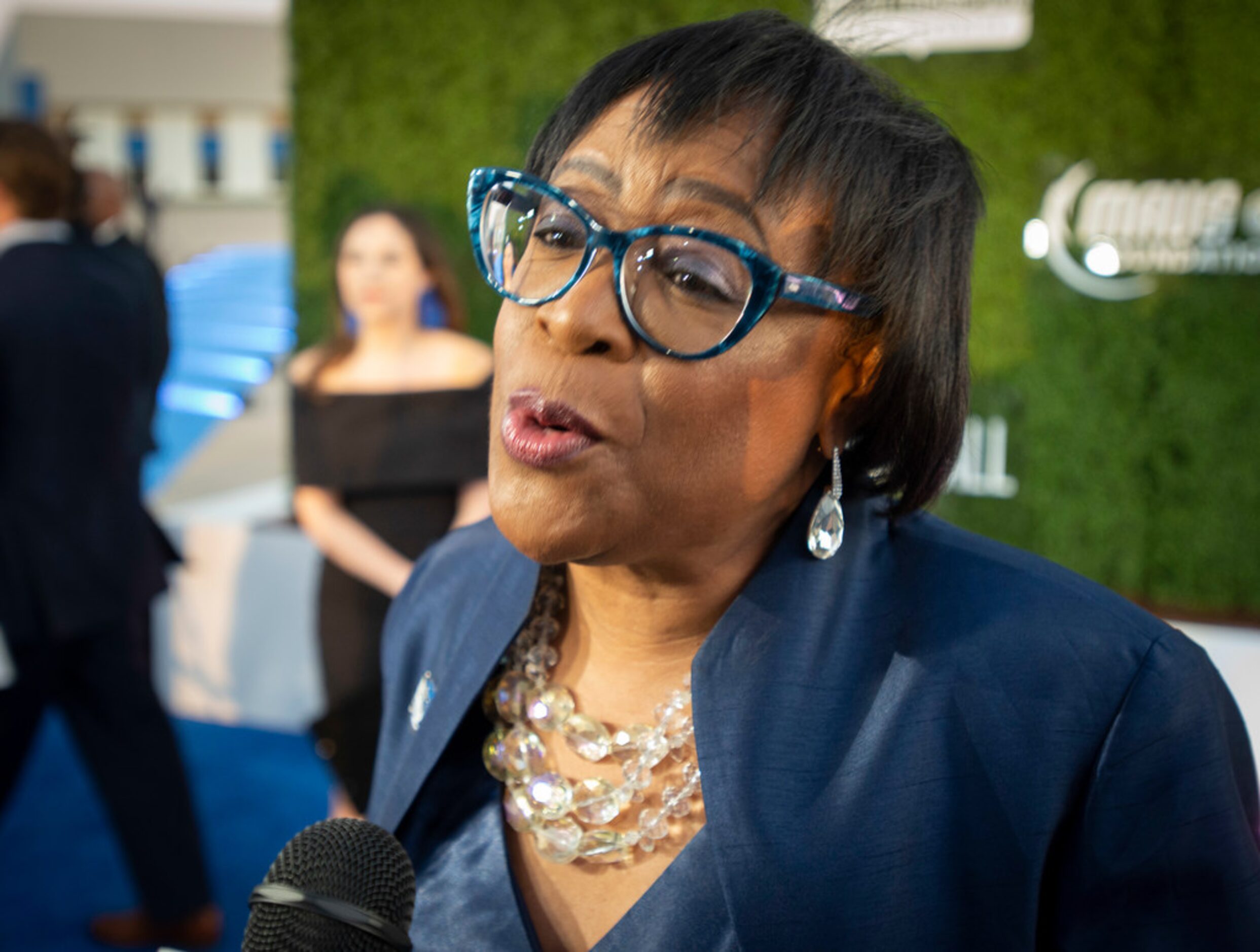 Dallas Mavericks CEO Cynthia Marshall pauses on the blue carpet prior to the Mavs Ball at...