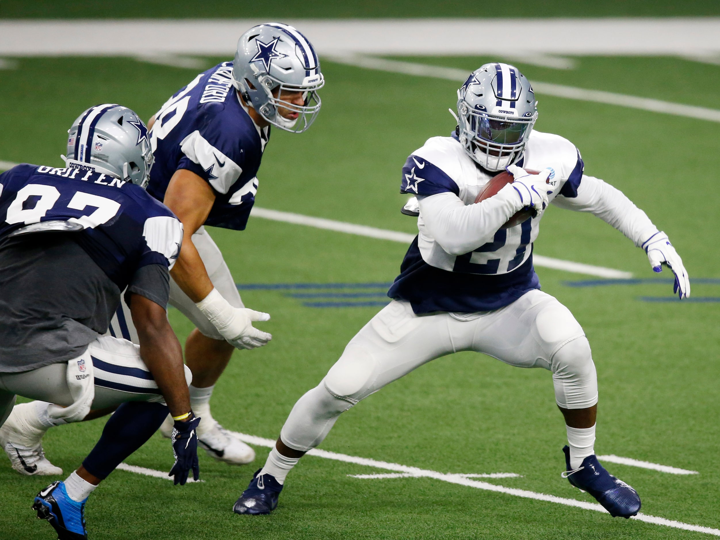 Dallas Cowboys running back Ezekiel Elliott (21) runs up the field as Dallas Cowboys...