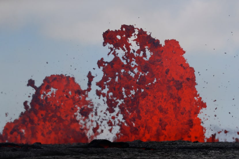 Fissures spew lava in the Leilani Estates subdivision near Pahoa, Hawaii, Tuesday, May 22. 