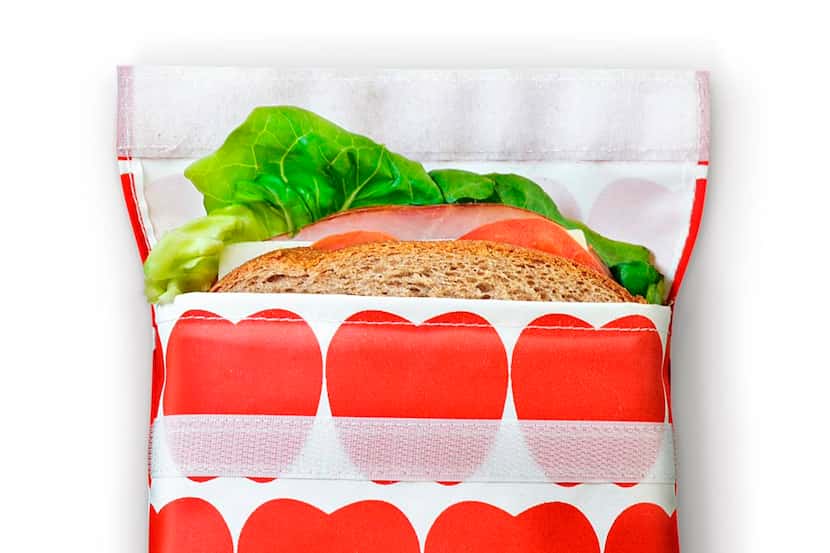 In this July 12, 2012 photo provided by LunchSkins, a reusable sandwich bag made from...