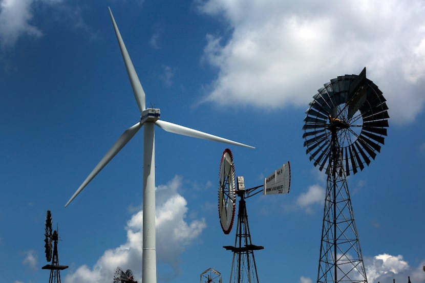 A large wind turbine is part of a collection of windmills at the American Wind Power Center...