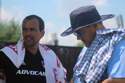 Oscar Pareja (left) chats with Buzz Carrick of 3rd Degree.