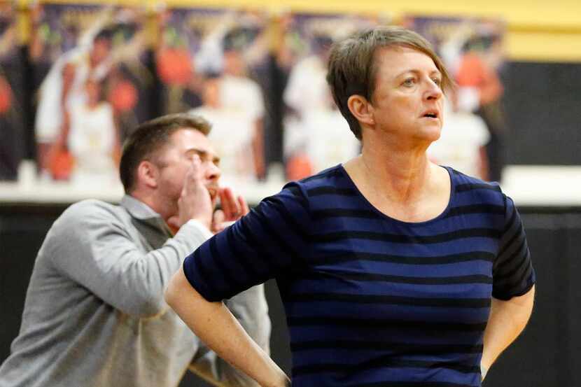 Donna McCullough, girls head basketball coach at Sachse High School looks on during the...