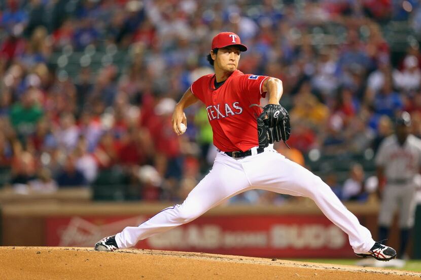 ARLINGTON, TX - SEPTEMBER 24:  Yu Darvish #11 of the Texas Rangers throws against the...