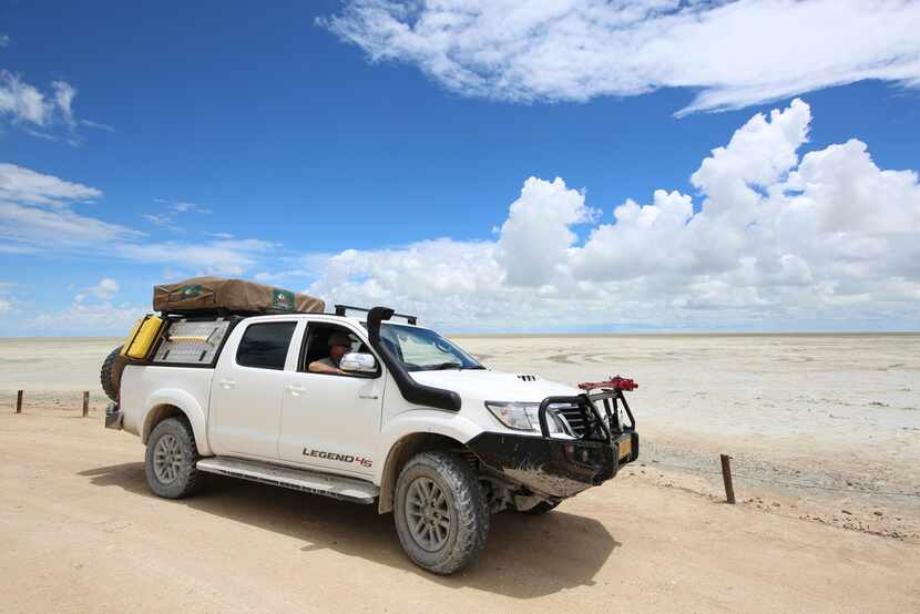 Rental car from Safari Car Rental Namibia in the Etosha salt pan. 