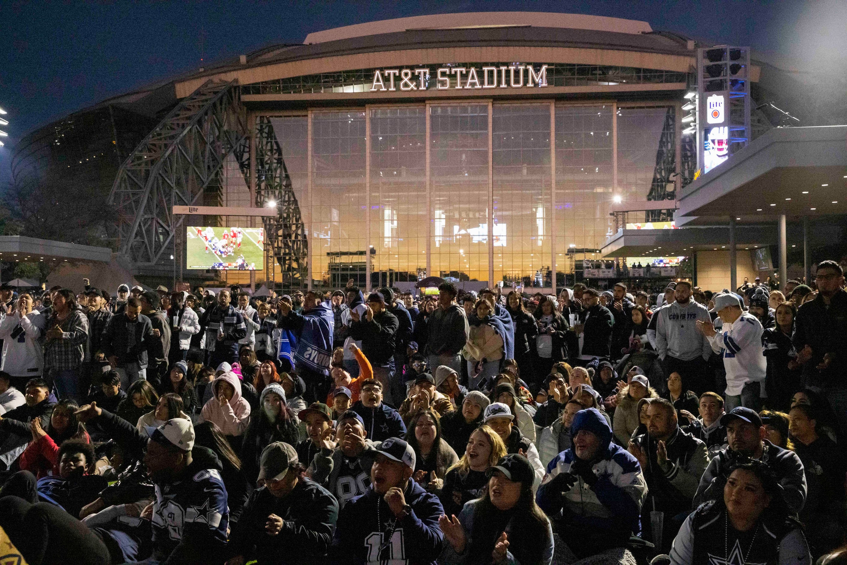 Dallas Cowboys watch as their team takes on the San Francisco 49ers in the Divisional round...