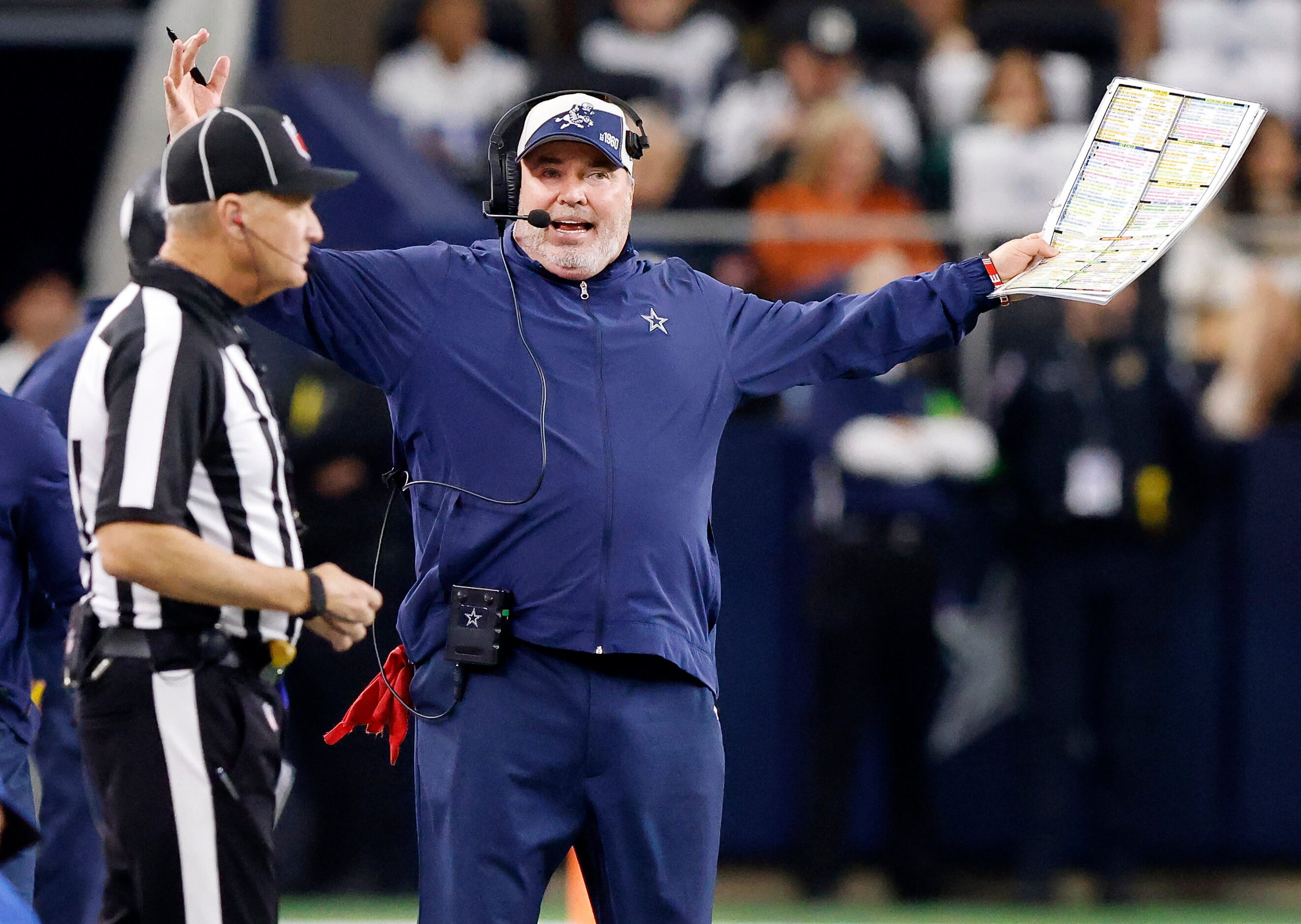 Dallas Cowboys head coach Mike McCarthy looks for a call from an official during the first...