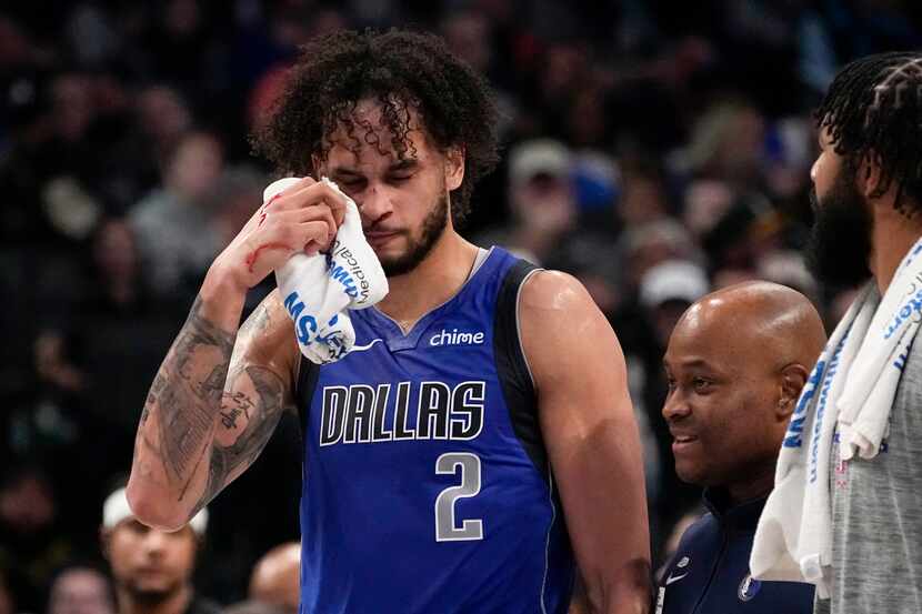 Dallas Mavericks' Dereck Lively II (2) walks off the court after suffering an injury in the...