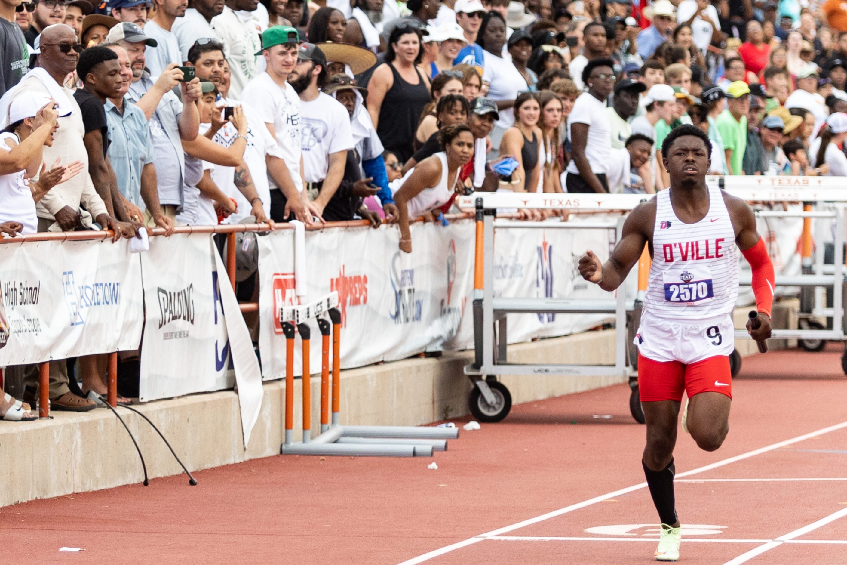 Jaylen Washington of Duncanville races to the finish in the boys’ 4x200-meter relay at the...