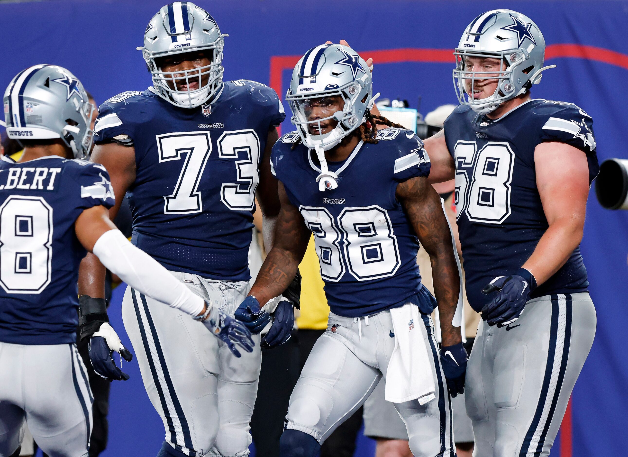 Dallas Cowboys wide receiver CeeDee Lamb (88) is congratulated on his fourth quarter...